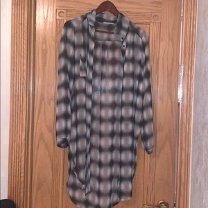 Gray plaid polyester long button  down shirt.